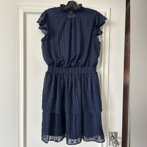 BCX cottage-chic details Swiss-dot covered dress, smocked at the waist, lined.